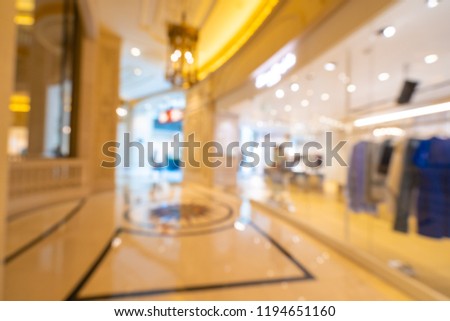 Abstract blur and defocused shopping mall of department store interior for background