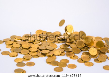 Movement of falling gold coin, flying coin, rain money with soft shadow on white background, business and financial wealth and take profit concept idea.