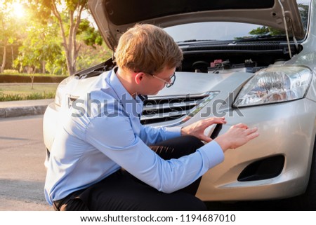 Insurance agent use phone take a photo car after accident, Insurance concept