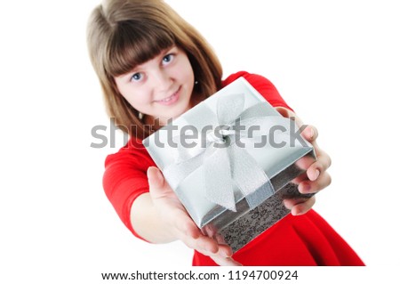 An image of young girl with gift box on white