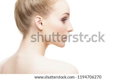 Beauty portrait of attractive blond girl. Makeup and cosmetics concept.