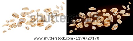 Oat flakes isolated on white and black backgrounds. Falling oats Royalty-Free Stock Photo #1194729178