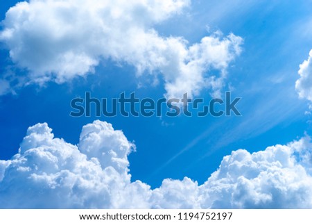 Sky blue, white clouds floating