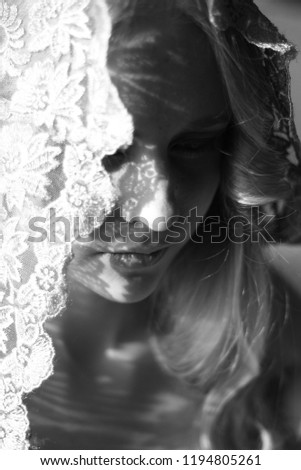 The girl in the lace handkerchief. Black and white photography