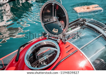 High tech mini submarine, preparing for underwater biology research. Marine life, seeking fish species and water data. Royalty-Free Stock Photo #1194839827