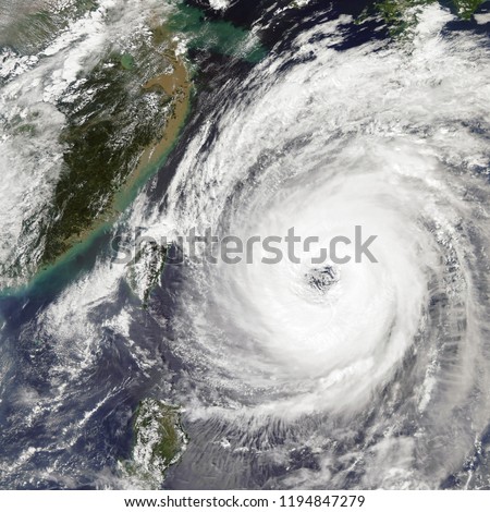 Typhoon Trami Takes Aim at Japan in the Western Pacific Ocean. Elements of this image furnished by NASA.