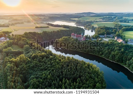 Sunrise over Czocha castle aerial view. Morning landscape