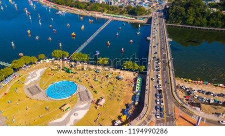 Aerial view of Jinju Namgang Yudeung Festival in Jinju city, South korea. Scenery has many lanterns are floating in the river.
