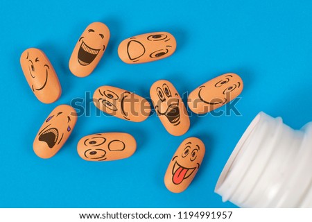 medicine tablets. Funny faces on the tablets

