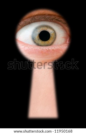 Eye in keyhole, isolated on black background