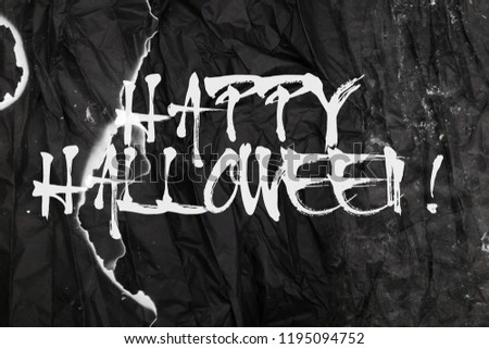 happy Halloween text, on black background.