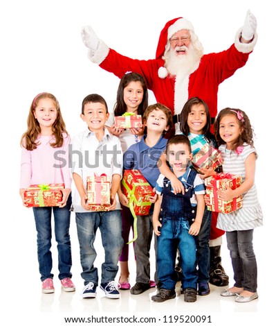Generous Santa Claus with a group of children holding presents - isolated