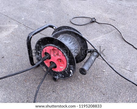 Electrical power extension cable reel at the repairs site