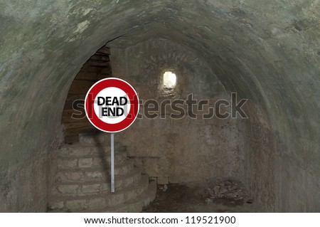 Dead end sign at the end of a crypt