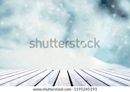 Wooden table with space for copying, image mounting and snow.