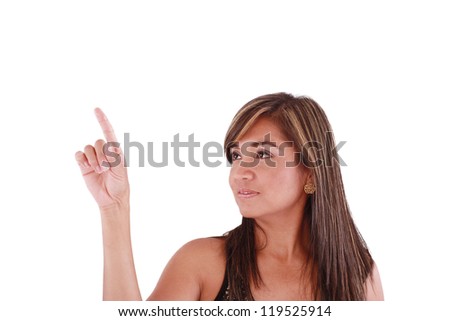 Portrait of young business woman pointing at white background. Isolated
