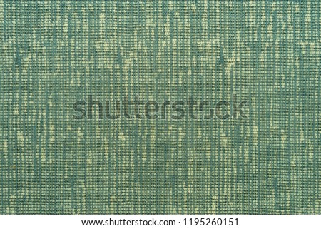 Green fabric texture background. Abstract background, empty template. Top view.