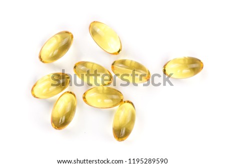 fish oil capsules isolated on white background. Top view. Flat lay pattern