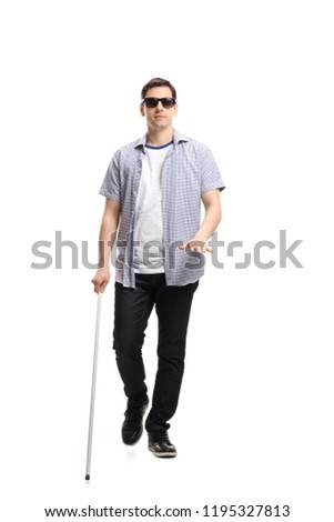 Full length portrait of a blind man walking isolated on white background Royalty-Free Stock Photo #1195327813