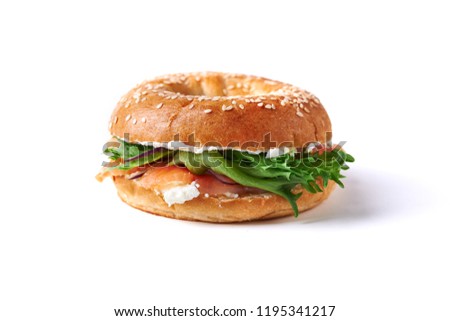 bagel with salmon and cream cheese isolated on white background Royalty-Free Stock Photo #1195341217