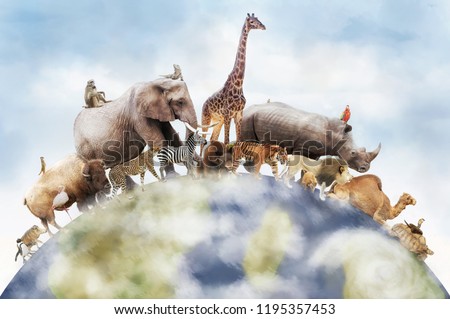 Conceptual image of wildlife around the planet earth can be used to celebrate World Animal Day Royalty-Free Stock Photo #1195357453