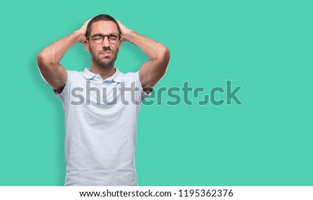 Depressed young man posing