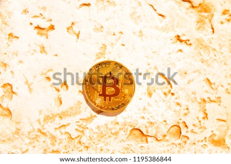 Crypto currency Gold Bitcoin, BTC, macro shot of Bitcoin coins on rock background,  bitcoin mining concept
