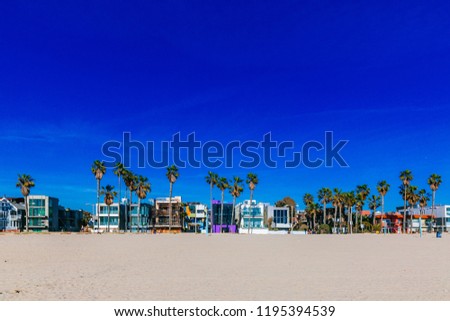 Houses and palm trees near Venice Beach, in Los Angeles, USA Royalty-Free Stock Photo #1195394539