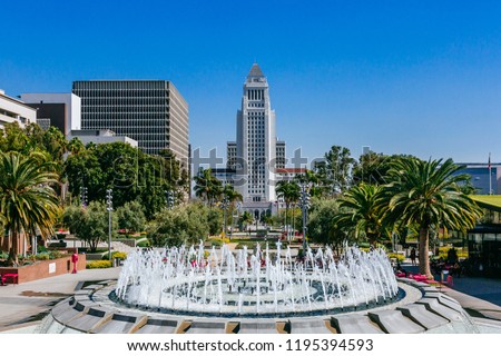 Fountain in Grand Park, and Los Angeles City Hall, in Downtown Los Angeles, California, USA Royalty-Free Stock Photo #1195394593