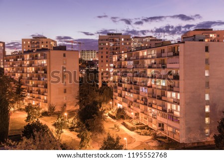 Sunset skies and night apartments in Kosice