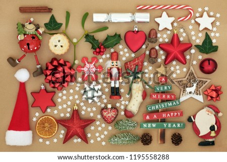 Symbols of Christmas collection including retro bauble tree decorations, food and winter flora, traditional items and snowflake sprinkles. Christmas greetings card for the holiday season. Top view.