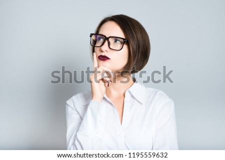 portrait of business woman is thoughtful, short hair, isolated on background