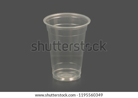 plastic cups on a gray background