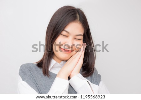 Sleep hand sign of beautiful asian smiling women skin care concept on white background