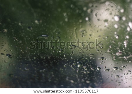 Rain drops on window glasses surface. 