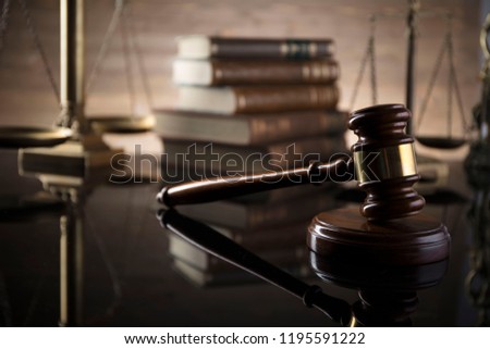 Judge's gavel, lady justice, scales, books. Law concept.
