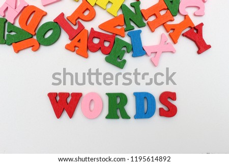 The word next with colored letters