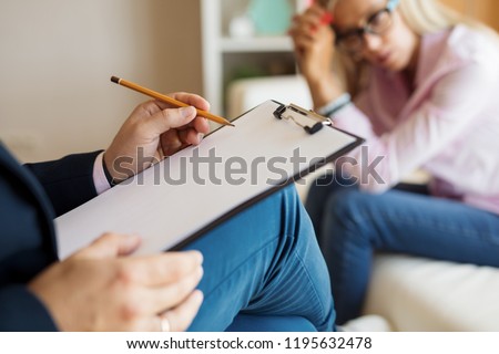 Woman at therapy session Royalty-Free Stock Photo #1195632478