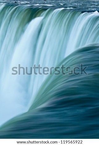 Close up of water rushing over Horseshoe Falls, Niagara Falls, Ontario, Canada