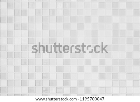 White or gray ceramic wall and floor tiles abstract background. Design geometric mosaic texture for the decoration of the bedroom. Simple seamless pattern for backdrop advertising banner poster or web