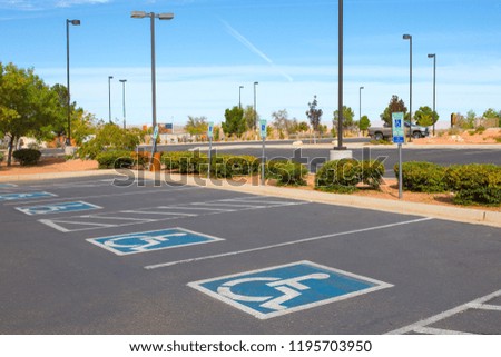 Handicapped parking spot in department store, transportation infrastructure road markings.
