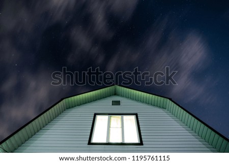 Green house and starry sky