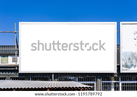 Blank billboard for advertisement in a sunny day.