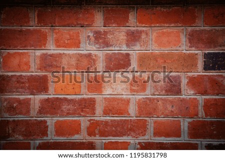 Many red bricks form a strong wall. It's a great way to get the word out for Christmas and Happy New Year. Abstract background