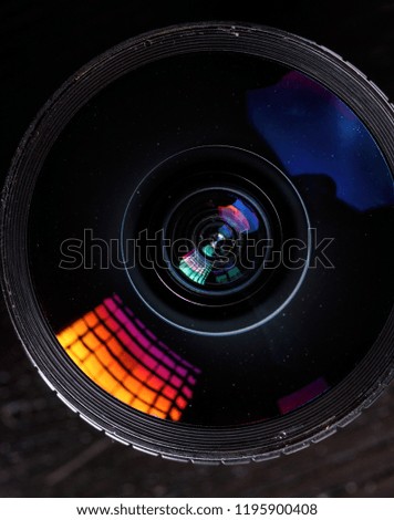 camera lens on dark background close-up