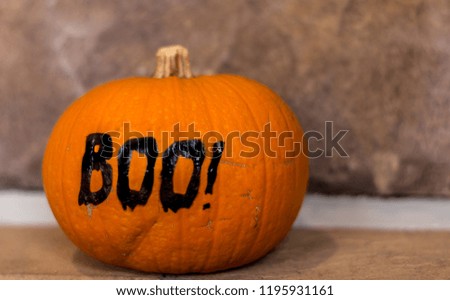 Orange pumpkin with boo for Halloween