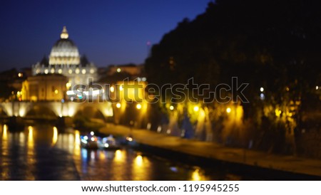 Out of focus camera moving across river near San Pietro Basilica in Vatican City