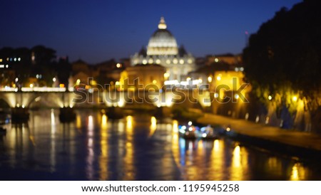 Out of focus camera moving across river near San Pietro Basilica in Vatican City