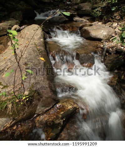 Small waterfall at foot