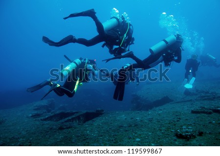 Divers and Marine shipwreck (Fort Marion) Royalty-Free Stock Photo #119599867